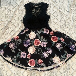 Floral dress with lace on upper part.